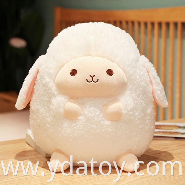 Plush pink rabbit pillow